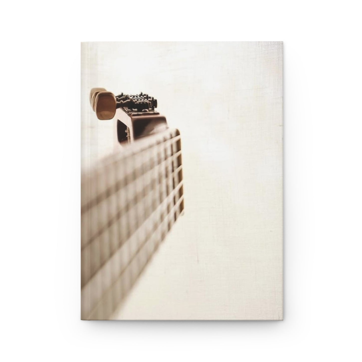 Music Guitar on White Journal